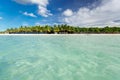 Beautiful view of Cuban Cayo Coco palm beach and tranquil, turquoise ocean on sunny gorgeous day