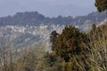 beautiful view of darjeeling hill station surrounded by lush green forest on the slopes of himalaya mountains Royalty Free Stock Photo