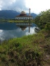 Beautiful view of Darul Quran Mosque with reflections during sunrise Royalty Free Stock Photo