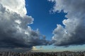 Beautiful view of dramatic dark stormy sky. The rain is coming soon. Pattern of the clouds over city. Royalty Free Stock Photo