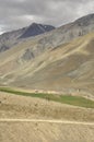 Beautiful view of dry mountains with cloudy sky on the way of Darcha-Padum road