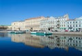 Beautiful view of embankment of Fontanka River with reflections in water, Saint Petersburg, Russia