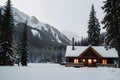 Beautiful view of Emerald Lake with snow covered and wooden lodge glowing in rocky mountains and pine forest on winter Royalty Free Stock Photo
