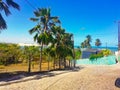 Beautiful view of the entrance to SibaÃÂºma Beach, Pipa, Brazil. Colorful path with palm trees.