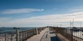 Beautiful view of eople walking along the harbor promenade Royalty Free Stock Photo