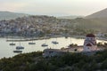 Beautiful view of Ermioni sea lagoon with moored yachts and boats at sunset time Royalty Free Stock Photo