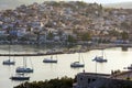 Beautiful view of Ermioni sea lagoon with moored yachts and boats at sunset time Royalty Free Stock Photo