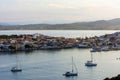 Beautiful view of Ermioni sea lagoon with moored yachts and boats at sunset time Royalty Free Stock Photo