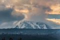A beautiful view of the eruption of volcano Etna with smoke and snow is in the photo in winter in Sicily Royalty Free Stock Photo