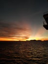 a beautiful view of the evening sky in the middle of the high seas