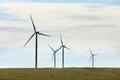 View of field with wind turbines. Alternative energy source Royalty Free Stock Photo