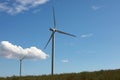 View of field with wind turbines. Alternative energy source Royalty Free Stock Photo