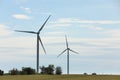 View of field with wind turbines. Alternative energy source Royalty Free Stock Photo