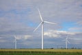 View of field with wind turbines. Alternative energy source Royalty Free Stock Photo