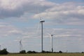 View of field with wind turbines. Alternative energy source Royalty Free Stock Photo