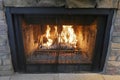 Beautiful view of a fire burning in a wood-burning fireplace in a home