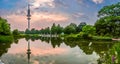 Beautiful view of flower garden in Planten um Blomen park with famous Heinrich-Hertz-Turm tower at dusk, Hamburg, Germany