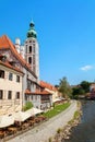 Beautiful view of the fragment of the bridge and the town of Cesky Krumlov with the Vltava river on a Sunny day.