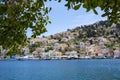 A Beautiful View of the Colorful Neo-Classical Houses in the Harbor of Symi, Greece Royalty Free Stock Photo