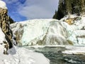 A beautiful view of a frozen waterfall at Wapta Falls in the Rocky Mountains in the background, in Yoho National Park Royalty Free Stock Photo