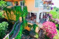 Beautiful view of the garden and cozy little hotel in tropical island