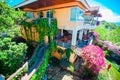 Beautiful view of the garden and cozy little hotel in tropical island