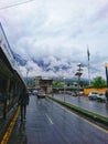 Beautiful view of Gilgit city after rain, clouds on mountains, wet road after rain, Gilgit Baltistan, 15th April 2023. Royalty Free Stock Photo