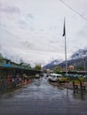 Beautiful view of Gilgit city after rain, clouds, wet road and Pakistani flag after rain, Gilgit Baltistan, 15th April 2023. Royalty Free Stock Photo