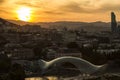 Beautiful view of glass Bridge of Peace in old Tbilisi at sunset, Georgia, Europe