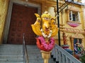 Beautiful view of Goddess Face in the Yellow Color Trishula or Trident in front of the Sri Gangamma Devi Temple Near Kadu