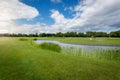 Beautiful view of golf course with water hindrance