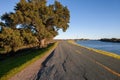 Beautiful view of the Grand Island road and the Sacramento River on a sunny day. Royalty Free Stock Photo