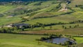 Beautiful view of green fields and meadows at sunset in Tuscany Royalty Free Stock Photo