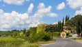 Beautiful view of green fields and meadows at sunset in Tuscany Royalty Free Stock Photo