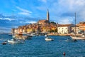 Beautiful view of the harbor, old town buildings and Campanile of Saint Euphemia Church of Rovinj city