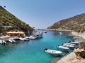 Beautiful view of the harbor with various boats on Shipwreck beach on Zakynthos (Zante)