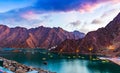 Beautiful view of Hatta Dam or Lake and Hajar Mountain in the Emirate of Dubai. Royalty Free Stock Photo