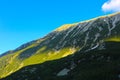 Beautiful view on the high green mountains peaks, on the colorful sunrise sky background. Mountain hiking paradise landscape, no Royalty Free Stock Photo