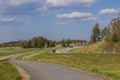 Beautiful view of highway with cars and asphalt road for pedestrians and cyclists in countryside. Royalty Free Stock Photo