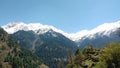 Beautiful view of Himalayan mountains, Flowers, Kasol Town, Parvati valley, Himachal Pradesh, India.