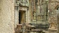 Historic Angkor Wat temple complex fading in a remote part of rural Cambodia.