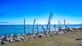 Beautiful view of a Hokitika sign with woods next to a sea in Hokitika, New Zealand