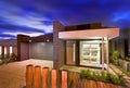 A beautiful view of a home in afternoon from front with garage a Royalty Free Stock Photo