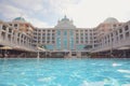 Beautiful view of hotel with swimming pool at resort Royalty Free Stock Photo