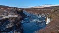 Beautiful view of Hraunfossar cascades near HÃÂºsafell in west Iceland on sunny winter day with wild river.