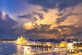 Beautiful view of the Hungarian Parliament and the Szechenyi chain bridge across the Danube in the panorama of Budapest at night Royalty Free Stock Photo