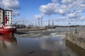 Beautiful view of icy Helsinki old port and sailboats with blue sky, Finland