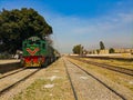 Beautiful view of train standing on railway platform. Pakistani train scenic view.