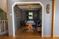 Beautiful view interior view of big room of private house of big wooden table and bench in dining room. Royalty Free Stock Photo