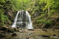 Beautiful view of the Josefsthaler waterfall in Schliersee, Germany.